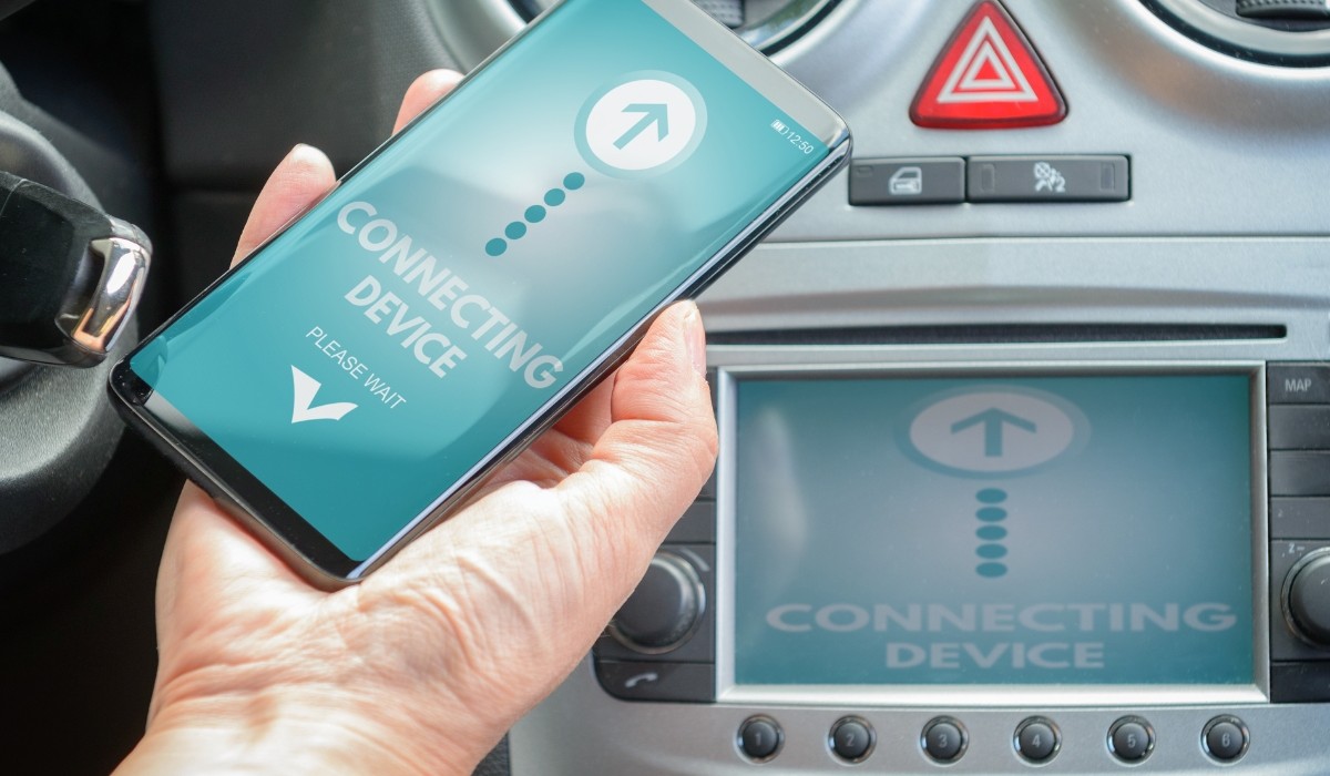  Image of phone attempting to connect to bluetooth radio in vehicle representing communications diagnosis. 