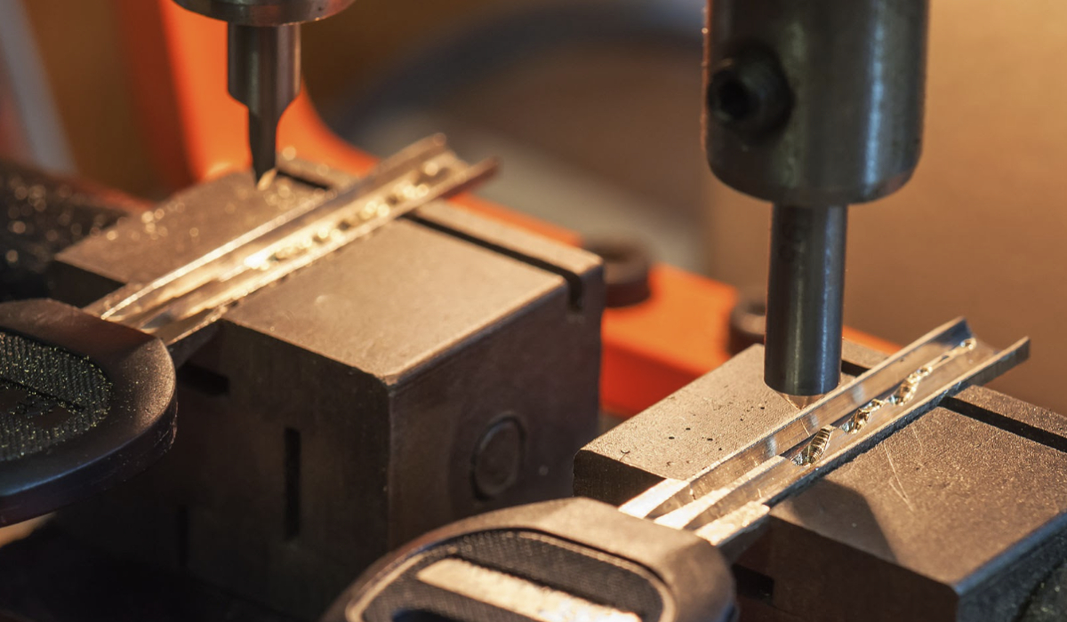  Image of open lock laying on top of circuit board to represent gaining access to security codes. 